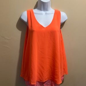 Sheer overlay top, v-neck, coral, sleeveless, lace edging on bottom